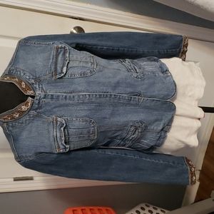 Ladies size large Paris Blues denim jacket. Velvet and ribbon embellishments.